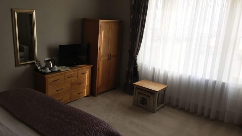 Imagen de la habitación del Hotel The Clyffe. Foto 7