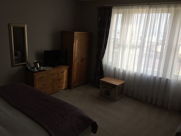 Imagen de la habitación del Hotel The Clyffe. Foto 10