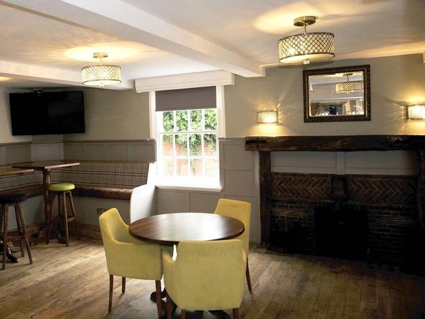Imagen del bar/restaurante del Hotel The Coach. Foto 8