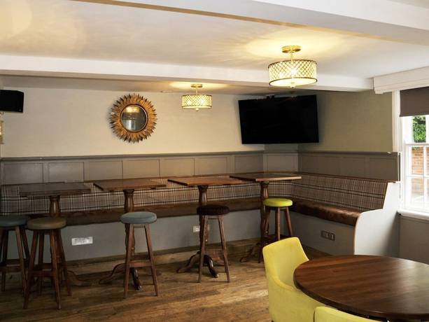 Imagen del bar/restaurante del Hotel The Coach. Foto 9