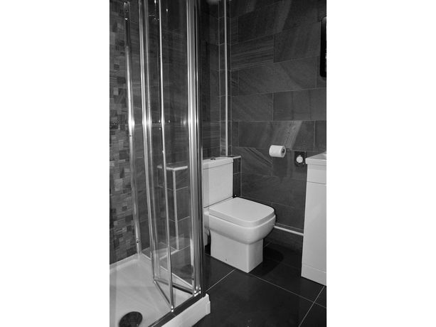 Imagen de la habitación del Hotel The Coach. Foto 18
