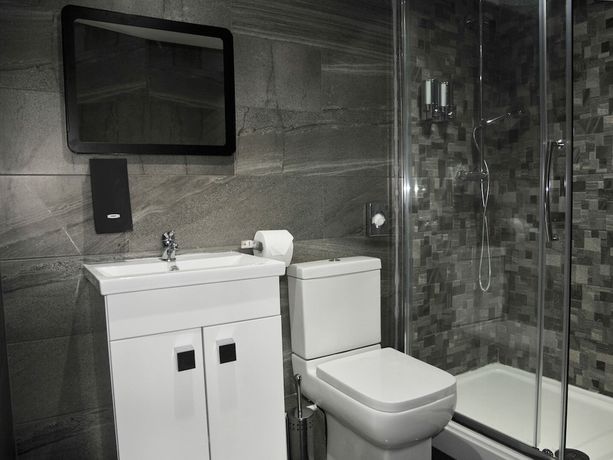 Imagen de la habitación del Hotel The Coach. Foto 19