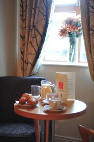 Imagen de la habitación del Hotel The Coach House, Oranmore. Foto 3