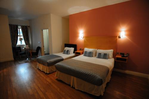 Imagen de la habitación del Hotel The Coach House, Oranmore. Foto 6