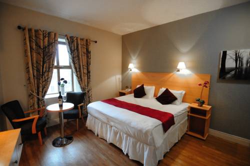 Imagen de la habitación del Hotel The Coach House, Oranmore. Foto 7