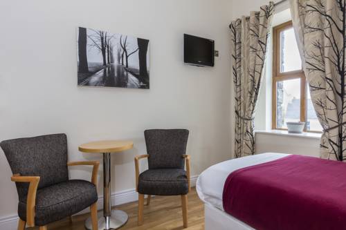 Imagen de la habitación del Hotel The Coach House, Oranmore. Foto 8