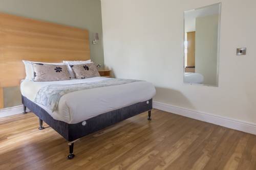 Imagen de la habitación del Hotel The Coach House, Oranmore. Foto 9