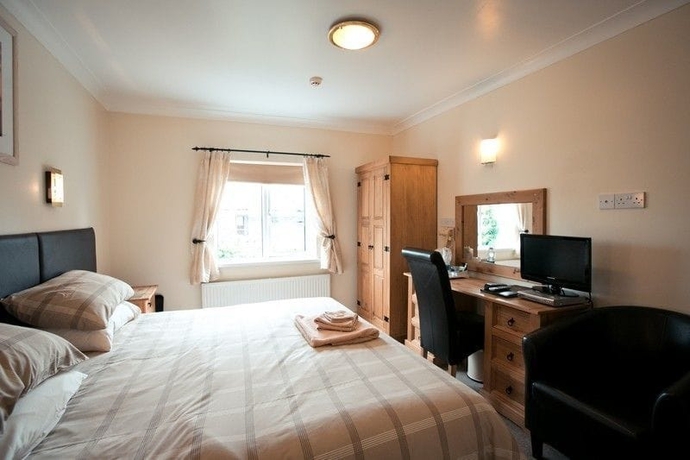 Imagen de la habitación del Hotel The Coach House, Pembroke. Foto 8