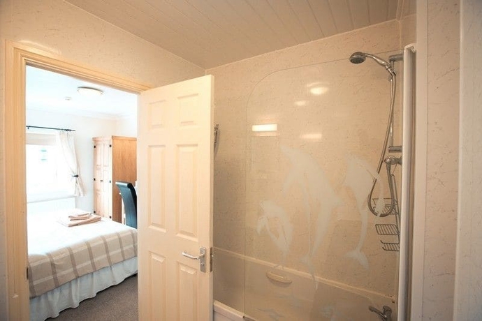 Imagen de la habitación del Hotel The Coach House, Pembroke. Foto 9