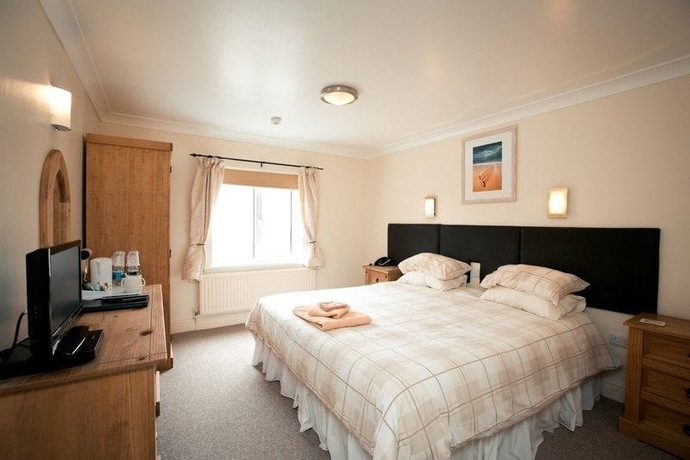 Imagen de la habitación del Hotel The Coach House, Pembroke. Foto 10