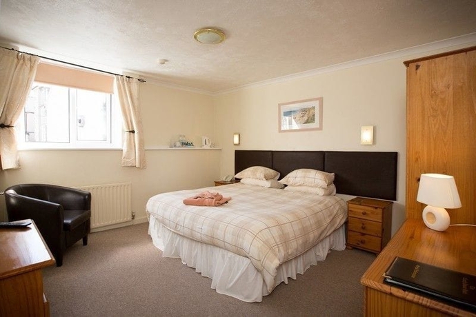 Imagen de la habitación del Hotel The Coach House, Pembroke. Foto 13