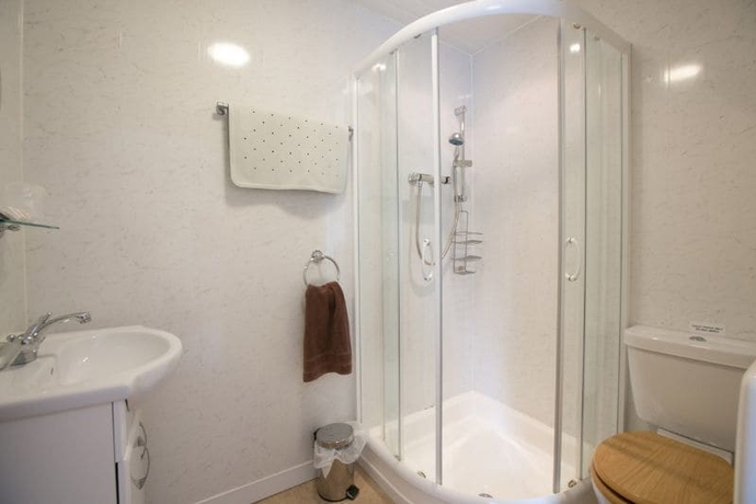 Imagen de la habitación del Hotel The Coach House, Pembroke. Foto 16