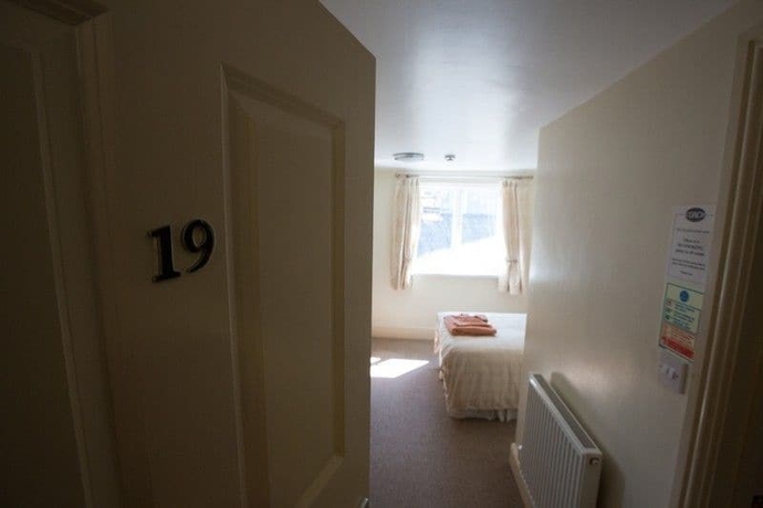 Imagen de la habitación del Hotel The Coach House, Pembroke. Foto 17