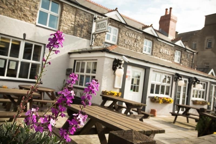 Imagen del bar/restaurante del Hotel The Coach House, Pembroke. Foto 5