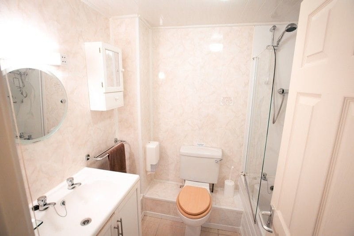 Imagen de la habitación del Hotel The Coach House, Pembroke. Foto 18
