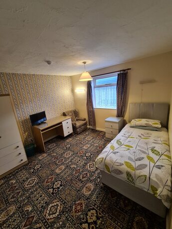 Imagen general del Hotel The Coach House Rooms. Foto 3