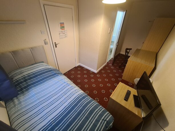 Imagen general del Hotel The Coach House Rooms. Foto 4