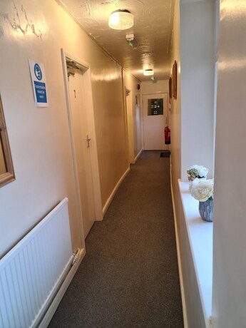 Imagen general del Hotel The Coach House Rooms. Foto 6