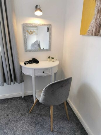 Imagen general del Hotel The Coach House Rooms. Foto 7