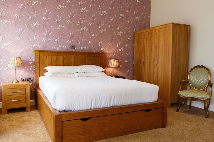Imagen de la habitación del Hotel The Coach House Suffolk. Foto 3