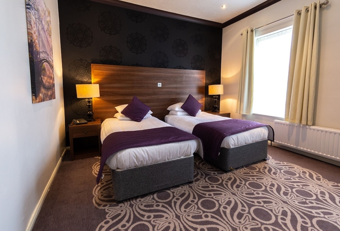 Imagen de la habitación del Hotel The Coach House Suffolk. Foto 8