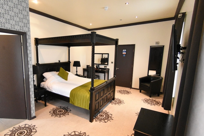 Imagen de la habitación del Hotel The Coach House Suffolk. Foto 14