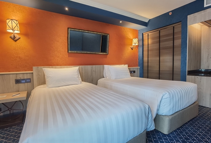 Imagen de la habitación del Hotel The Coach Sukhumvit / Asok Bts Bangkok By Compass Hospitality. Foto 3