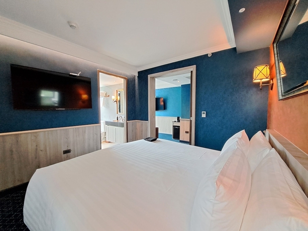 Imagen de la habitación del Hotel The Coach Sukhumvit / Asok Bts Bangkok By Compass Hospitality. Foto 5