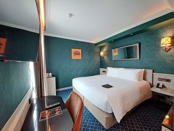 Imagen de la habitación del Hotel The Coach Sukhumvit / Asok Bts Bangkok By Compass Hospitality. Foto 7