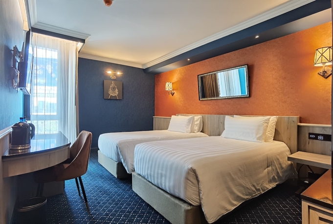 Imagen de la habitación del Hotel The Coach Sukhumvit / Asok Bts Bangkok By Compass Hospitality. Foto 11