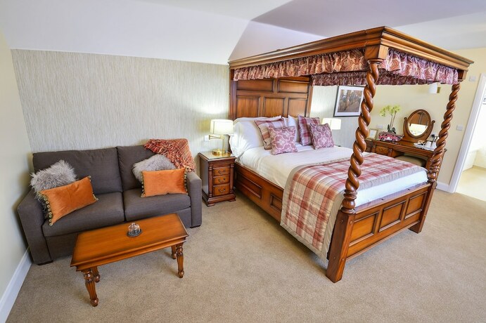 Imagen de la habitación del Hotel The Coach and Horses. Foto 15