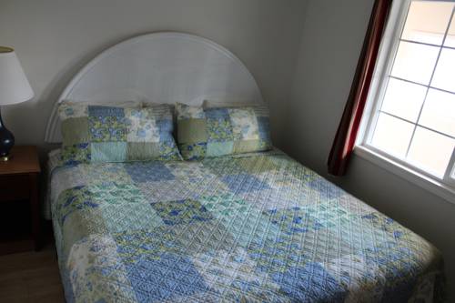 Imagen de la habitación del Hotel The Coastal Inn and Suites. Foto 9