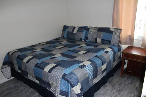 Imagen de la habitación del Hotel The Coastal Inn and Suites. Foto 11