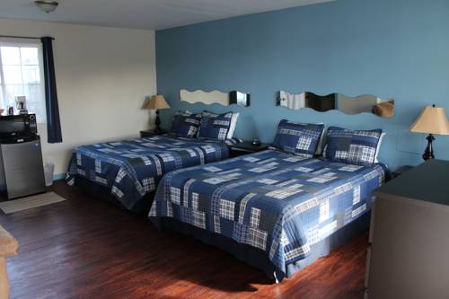 Imagen de la habitación del Hotel The Coastal Inn and Suites. Foto 15
