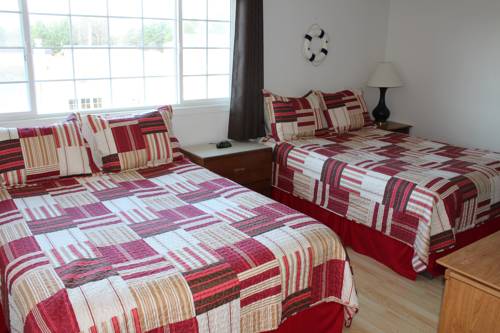Imagen de la habitación del Hotel The Coastal Inn and Suites. Foto 16