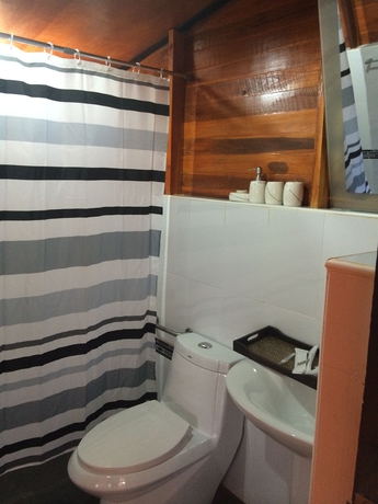 Imagen de la habitación del Hotel The Cobble Beach. Foto 11