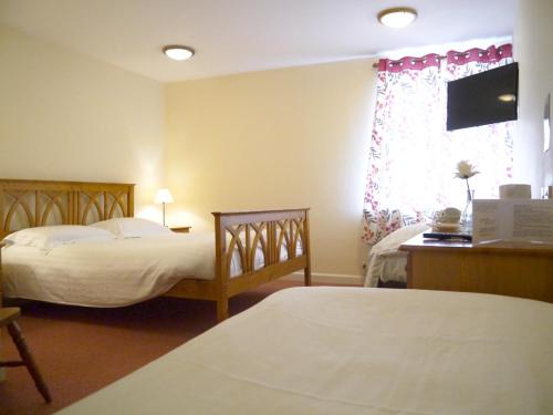 Imagen de la habitación del Hotel The Cock Inn. Foto 7