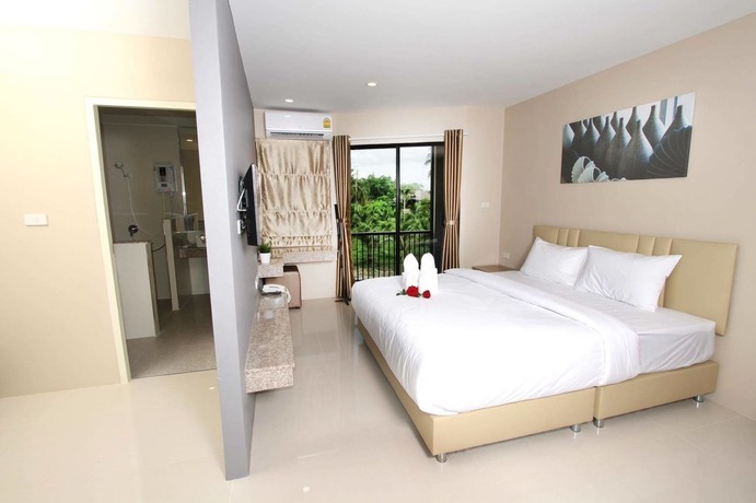 Imagen de la habitación del Hotel The Coconut. Foto 6