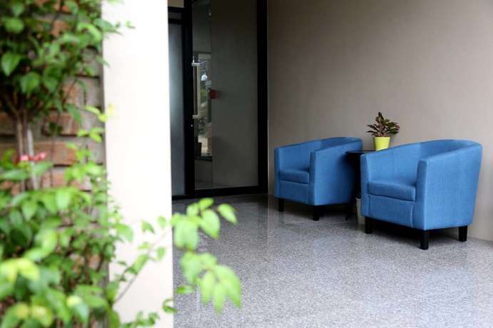 Imagen de la habitación del Hotel The Coconut. Foto 7
