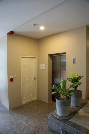 Imagen de la habitación del Hotel The Coconut. Foto 8