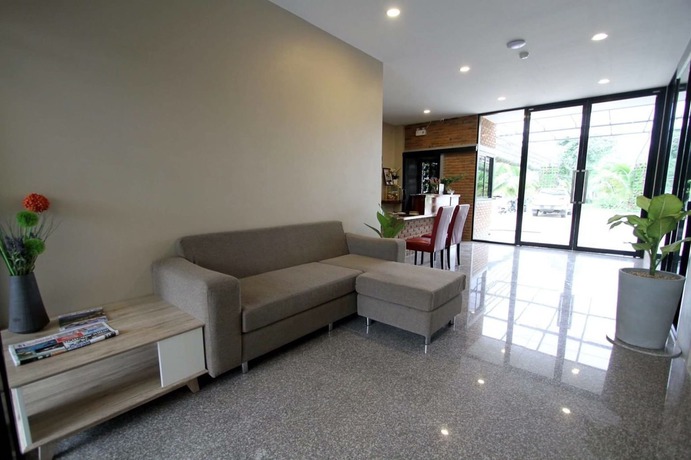 Imagen de la habitación del Hotel The Coconut. Foto 9