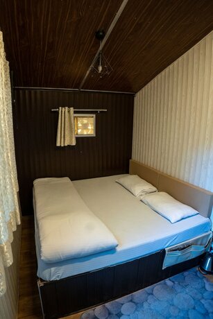 Imagen de la habitación del Hotel The Cocoon Camps And Nature Resorts. Foto 15