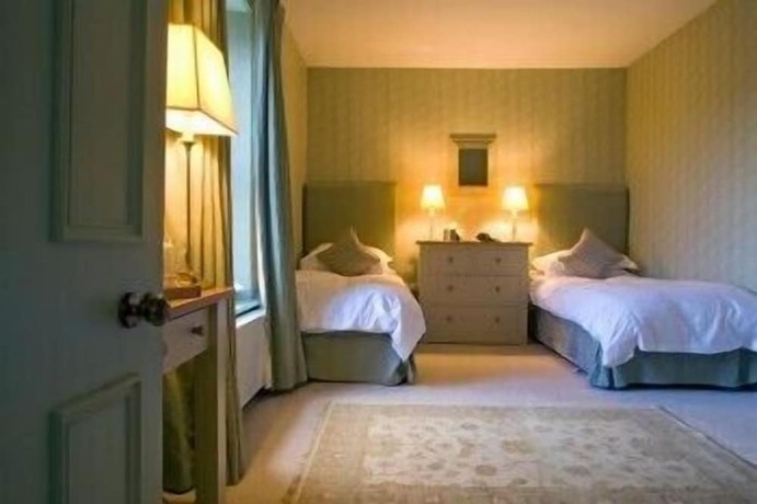 Imagen de la habitación del Hotel The Collingwood Arms. Foto 17