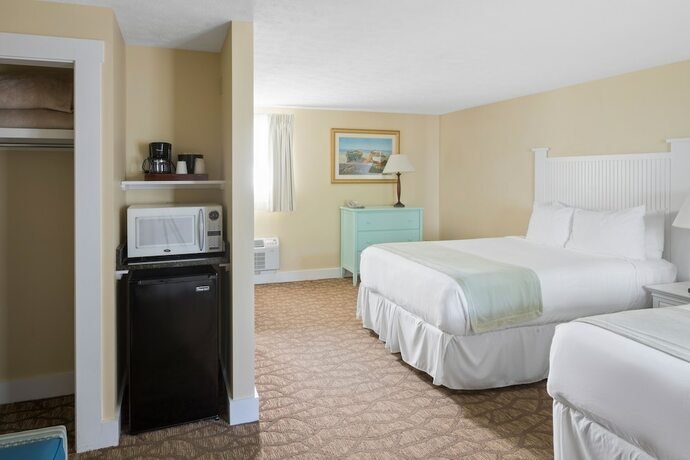 Imagen de la habitación del Hotel The Colonial Inn. Foto 13