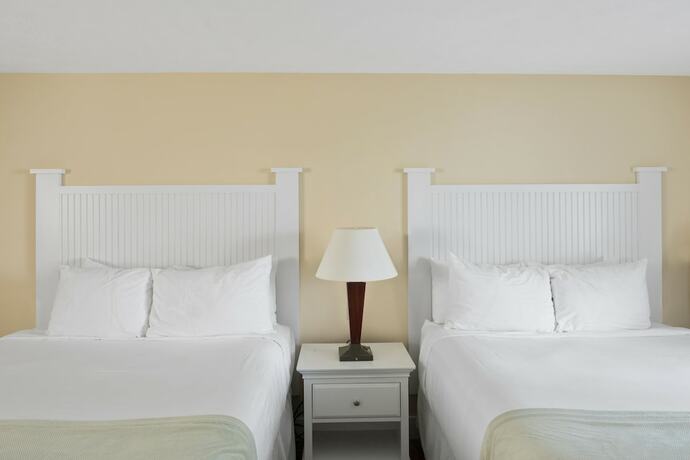 Imagen de la habitación del Hotel The Colonial Inn. Foto 14