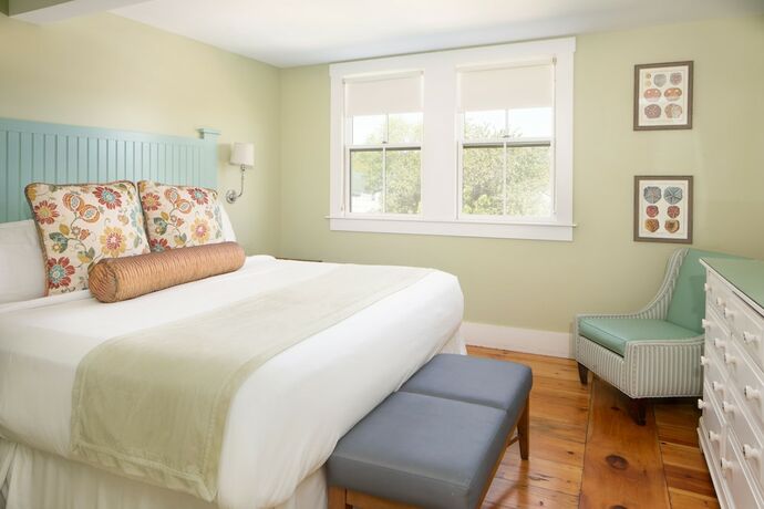 Imagen de la habitación del Hotel The Colonial Inn. Foto 17