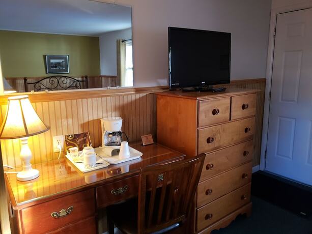 Imagen de la habitación del Hotel The Colonial Motel. Foto 11