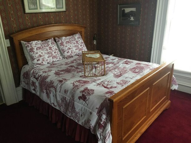 Imagen de la habitación del Hotel The Colonial Motel. Foto 17