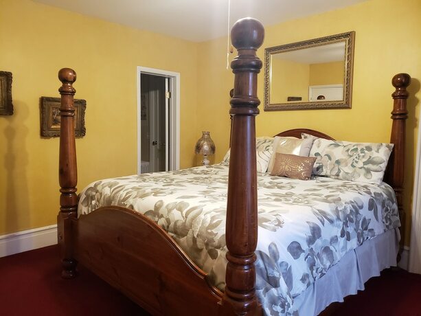 Imagen de la habitación del Hotel The Colonial Motel. Foto 19