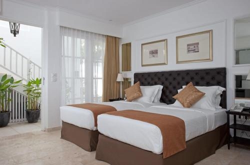 Imagen de la habitación del Hotel The Colony Bali. Foto 6